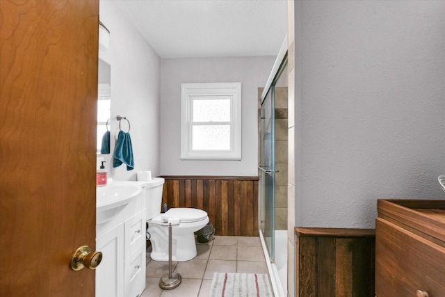 9101 US Highway 36, Metcalf, IL 61940 - bathroom with vanity, a shower stall, tile patterned flooring, and a textured ceiling