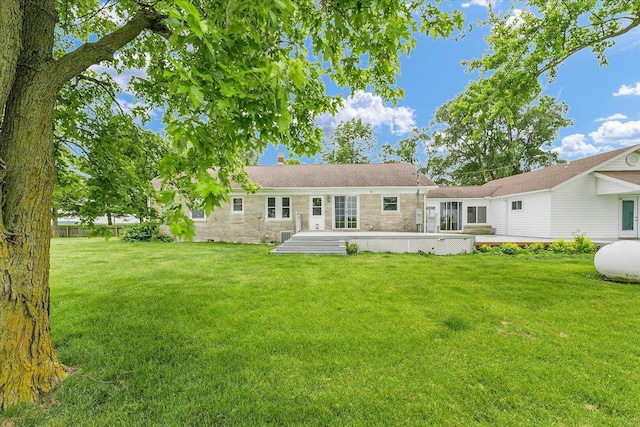 9101 US Highway 36, Metcalf, IL 61940 - rear view of house with stone siding, a lawn, a chimney, and a patio