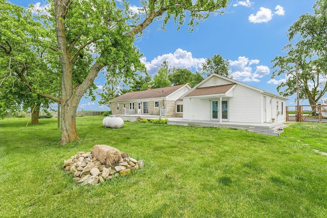 9101 US Highway 36, Metcalf, IL 61940 - back of house featuring a yard and a deck