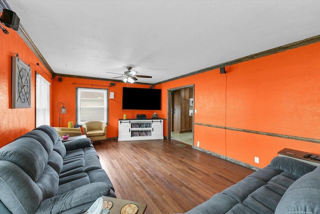 9101 US Highway 36, Metcalf, IL 61940 - living area with crown molding, wood finished floors, ceiling fan, and a textured ceiling