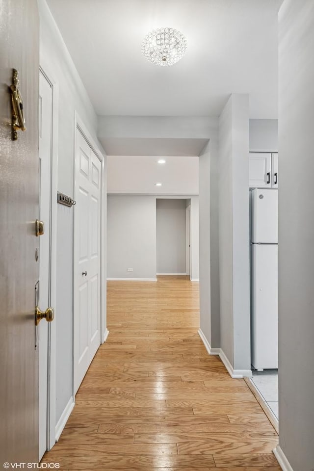 2336 N Commonwealth Ave Unit 108, Chicago, IL 60614 - hallway featuring light wood finished floors and recessed lighting