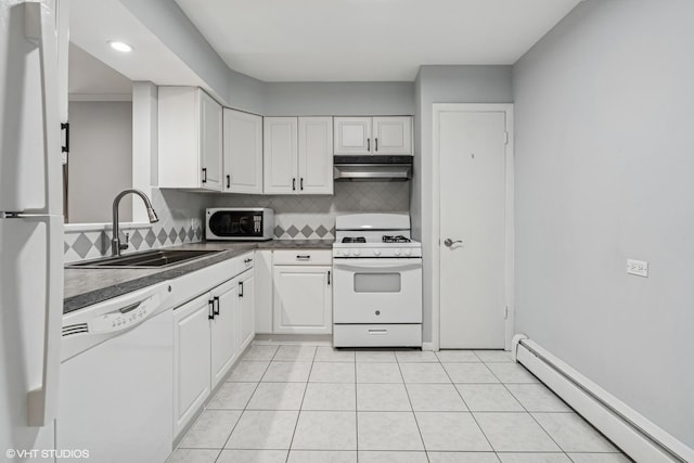 2336 N Commonwealth Ave Unit 108, Chicago, IL 60614 - kitchen featuring white appliances, a baseboard heating unit, range hood, and white cabinetry