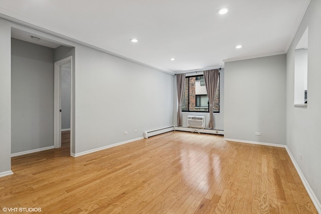 2336 N Commonwealth Ave Unit 108, Chicago, IL 60614 - unfurnished room featuring light wood finished floors, recessed lighting, crown molding, and baseboard heating