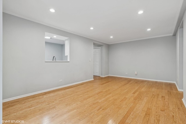 2336 N Commonwealth Ave Unit 108, Chicago, IL 60614 - spare room featuring crown molding, recessed lighting, and light wood-style flooring