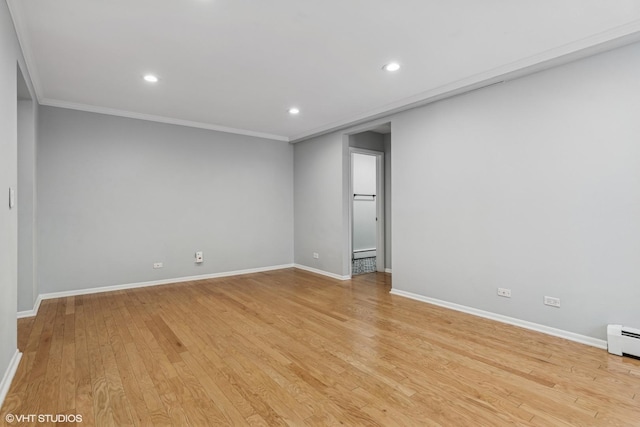 2336 N Commonwealth Ave Unit 108, Chicago, IL 60614 - unfurnished room featuring light wood finished floors, ornamental molding, and recessed lighting