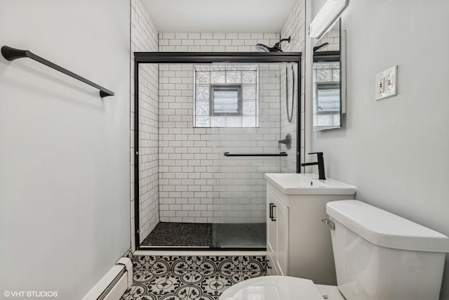 2336 N Commonwealth Ave Unit 108, Chicago, IL 60614 - full bathroom with a stall shower, vanity, and a baseboard heating unit