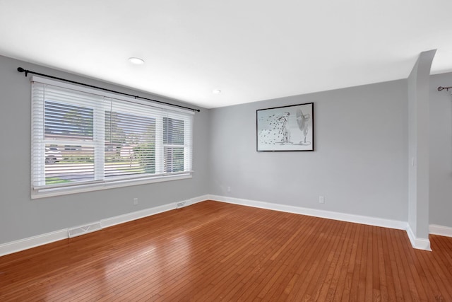 717 Bittersweet Ln, New Lenox, IL 60451 - empty room with wood-type flooring and recessed lighting