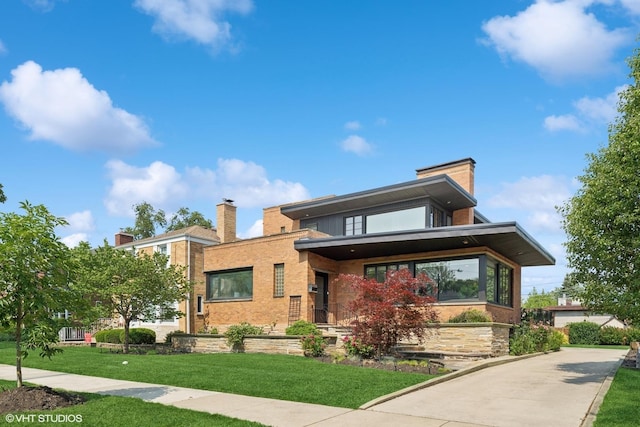 9333 S Oakley Ave, Chicago, IL 60643 - contemporary house with a front yard, a chimney, and brick siding
