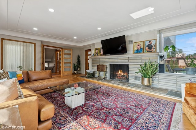 9333 S Oakley Ave, Chicago, IL 60643 - living room featuring a tiled fireplace and recessed lighting