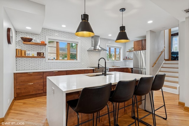 9333 S Oakley Ave, Chicago, IL 60643 - kitchen with wall chimney range hood, freestanding refrigerator, open shelves, brown cabinetry, and recessed lighting