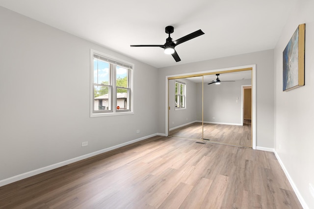 3616 Tamarind Ln, Hazel Crest, IL 60429 - unfurnished bedroom featuring light wood finished floors, a closet, and ceiling fan