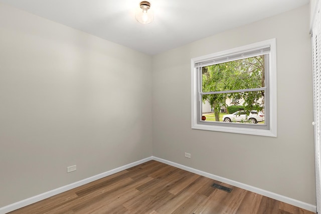 3616 Tamarind Ln, Hazel Crest, IL 60429 - spare room featuring wood finished floors and baseboards