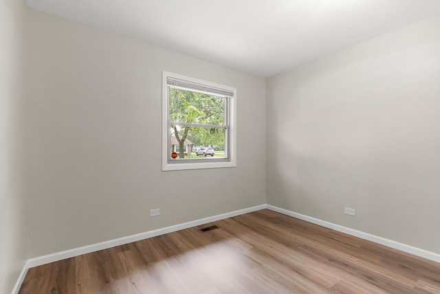 3616 Tamarind Ln, Hazel Crest, IL 60429 - unfurnished room with wood finished floors