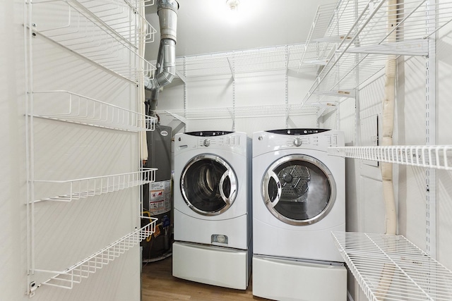 3616 Tamarind Ln, Hazel Crest, IL 60429 - washroom featuring washing machine and clothes dryer and wood finished floors