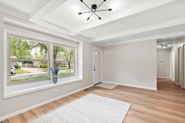 3616 Tamarind Ln, Hazel Crest, IL 60429 - foyer with a chandelier, beam ceiling, and light wood-type flooring