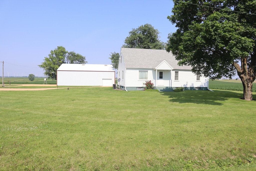 24871 1800th St E, Walnut, IL 61376 - view of front of house featuring a front lawn