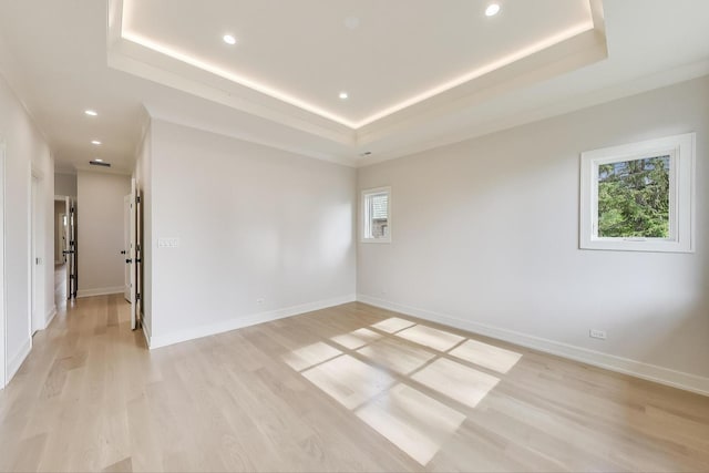1437 Ashland Ave, River Forest, IL 60305 - unfurnished room featuring a raised ceiling, recessed lighting, and light wood-style floors