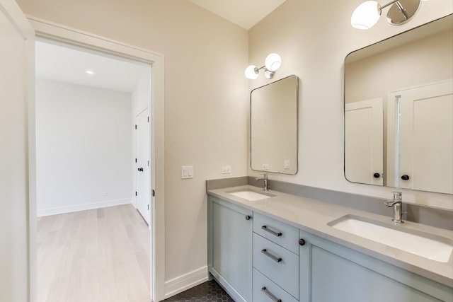1437 Ashland Ave, River Forest, IL 60305 - bathroom with double vanity and wood finished floors