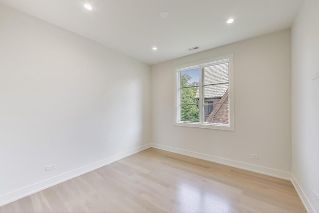 1437 Ashland Ave, River Forest, IL 60305 - empty room with light wood-style floors and recessed lighting