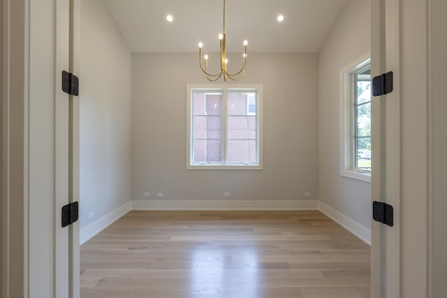 1437 Ashland Ave, River Forest, IL 60305 - unfurnished room with light wood-style flooring, a chandelier, and recessed lighting