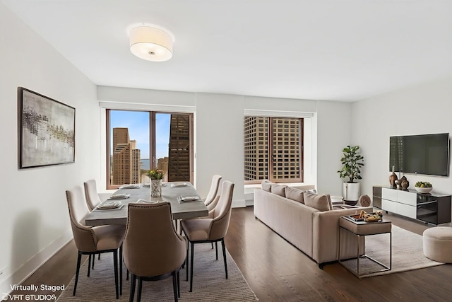161 E Chicago Ave Unit 40G, Chicago, IL 60611 - dining area featuring dark wood finished floors