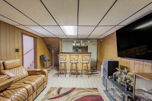 1330 E 146th St, Dolton, IL 60419 - indoor dry bar featuring wood walls, stairway, carpet, and a paneled ceiling