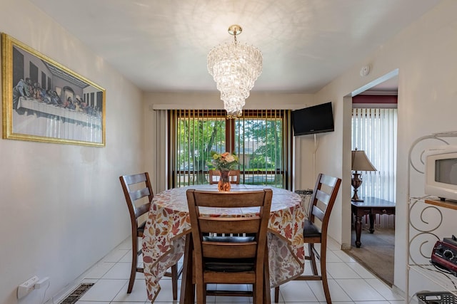 1330 E 146th St, Dolton, IL 60419 - dining room with a chandelier, plenty of natural light, and light tile patterned floors