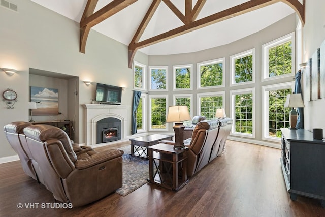 1310 Gavin Ct, Lake Forest, IL 60045 - living room featuring high vaulted ceiling, a lit fireplace, beam ceiling, and dark wood-type flooring