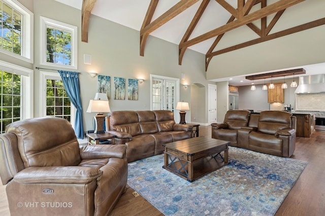 1310 Gavin Ct, Lake Forest, IL 60045 - living room featuring high vaulted ceiling, arched walkways, beamed ceiling, and wood finished floors