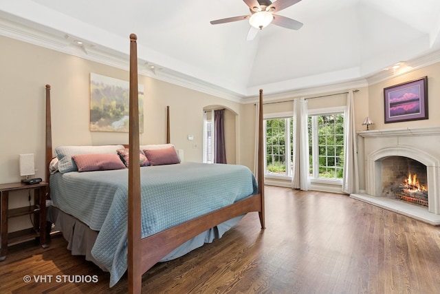 1310 Gavin Ct, Lake Forest, IL 60045 - bedroom featuring arched walkways, a premium fireplace, vaulted ceiling, wood finished floors, and ornamental molding