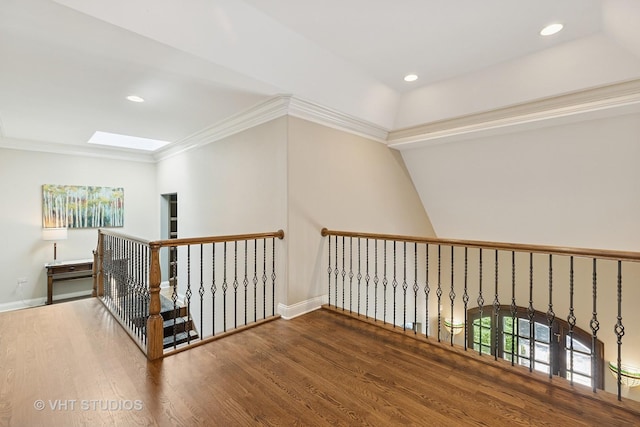 1310 Gavin Ct, Lake Forest, IL 60045 - hall featuring a skylight, wood finished floors, recessed lighting, crown molding, and an upstairs landing