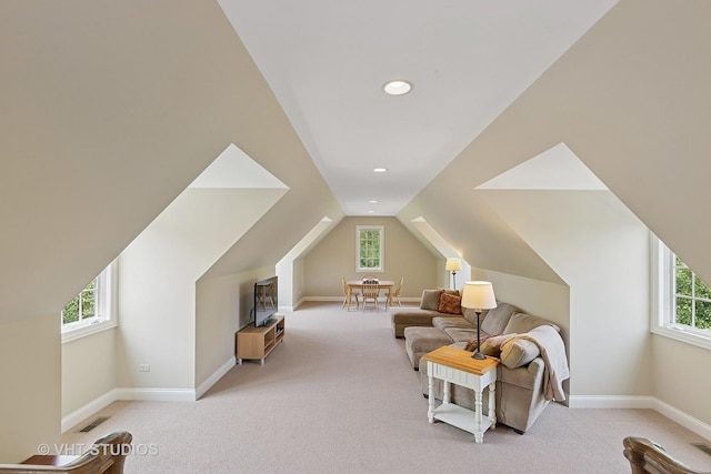1310 Gavin Ct, Lake Forest, IL 60045 - living area featuring light colored carpet, vaulted ceiling, and recessed lighting