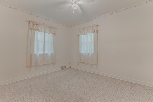 716 Kirkwood Ave, Winthrop Harbor, IL 60096 - unfurnished room featuring a ceiling fan and carpet floors