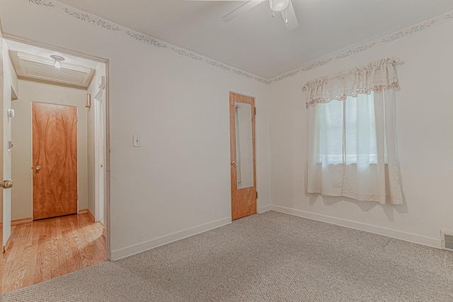 716 Kirkwood Ave, Winthrop Harbor, IL 60096 - spare room with ceiling fan and carpet