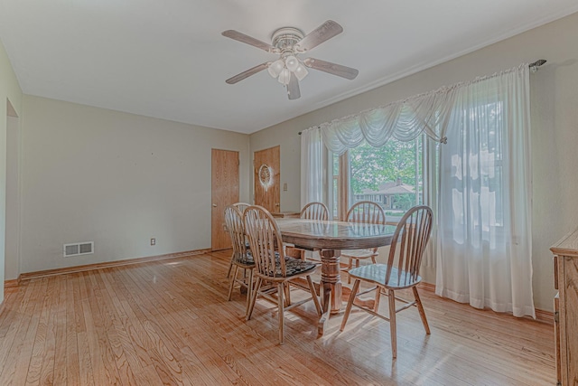 716 Kirkwood Ave, Winthrop Harbor, IL 60096 - dining space with a ceiling fan and light wood-type flooring