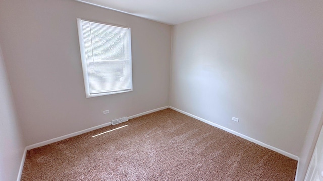 6024 Beechwood Rd, Matteson, IL 60443 - carpeted empty room featuring baseboards