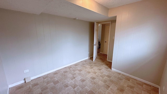 6024 Beechwood Rd, Matteson, IL 60443 - unfurnished room featuring a textured ceiling