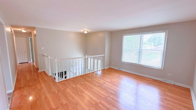 6024 Beechwood Rd, Matteson, IL 60443 - unfurnished room featuring light wood-style floors and baseboards