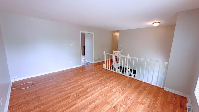 6024 Beechwood Rd, Matteson, IL 60443 - spare room with wood finished floors and baseboards