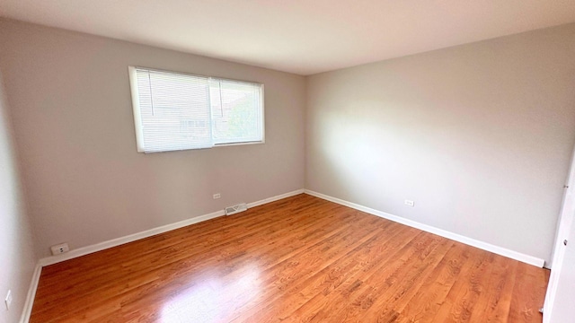 6024 Beechwood Rd, Matteson, IL 60443 - spare room with light wood-type flooring