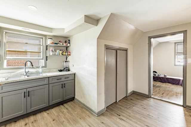 4636 S Keating Ave, Chicago, IL 60632 - bar with light wood-style flooring and vaulted ceiling