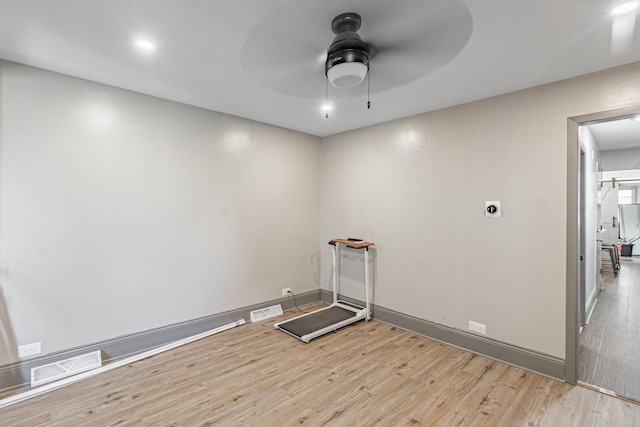 4636 S Keating Ave, Chicago, IL 60632 - spare room with light wood-style flooring and a ceiling fan
