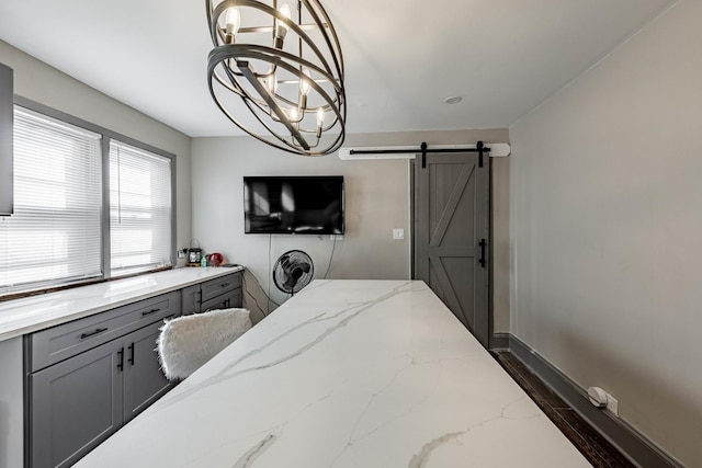4636 S Keating Ave, Chicago, IL 60632 - bedroom featuring a barn door and a chandelier