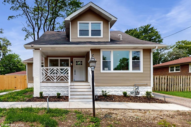 15230 State St, South Holland, IL 60473 - bungalow with covered porch and a shingled roof