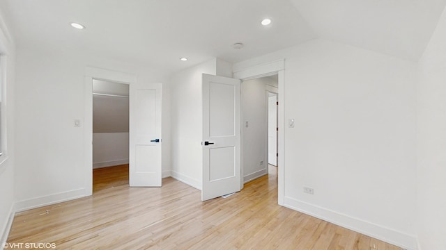 15230 State St, South Holland, IL 60473 - spare room with light wood-style floors, recessed lighting, and lofted ceiling