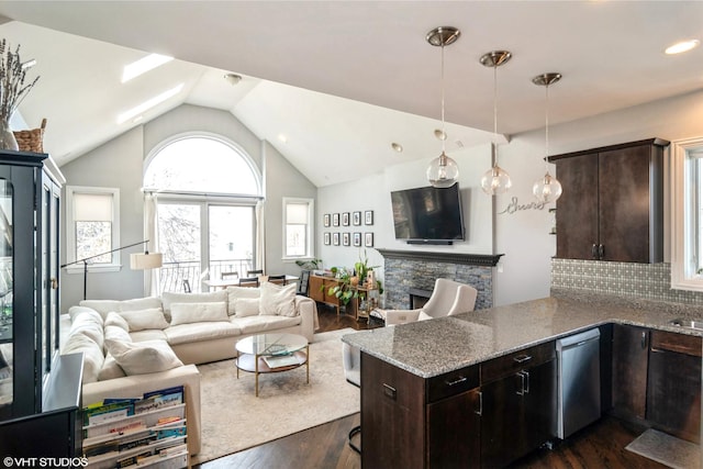 2013 W Rice St Unit 3, Chicago, IL 60622 - living area featuring dark wood-style floors, vaulted ceiling, recessed lighting, and a fireplace