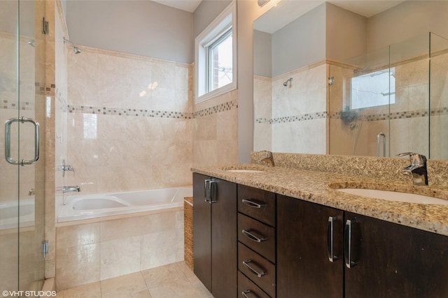 2013 W Rice St Unit 3, Chicago, IL 60622 - bathroom with a shower stall, double vanity, a bath, tile walls, and tile patterned floors