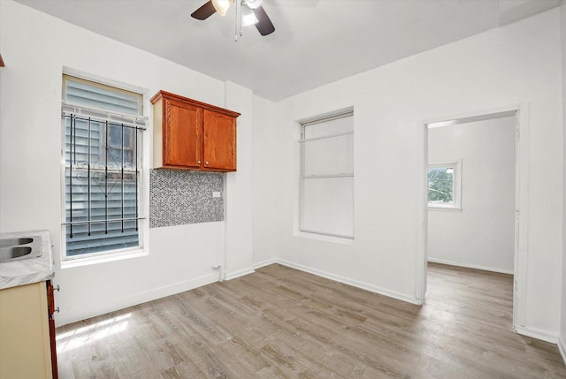 1318 S Kolin Ave, Chicago, IL 60623 - empty room featuring a ceiling fan and light wood-style floors