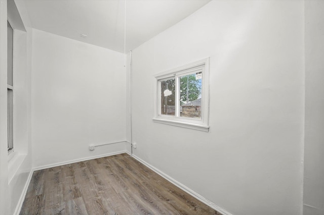 1318 S Kolin Ave, Chicago, IL 60623 - spare room featuring wood finished floors and baseboards