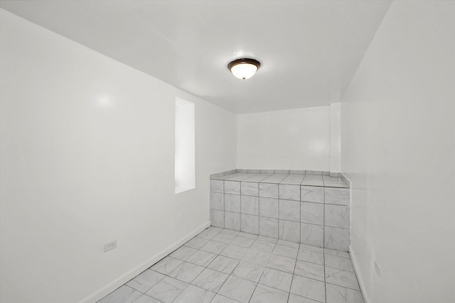 1318 S Kolin Ave, Chicago, IL 60623 - sauna / steam room with baseboards and marble look tiles